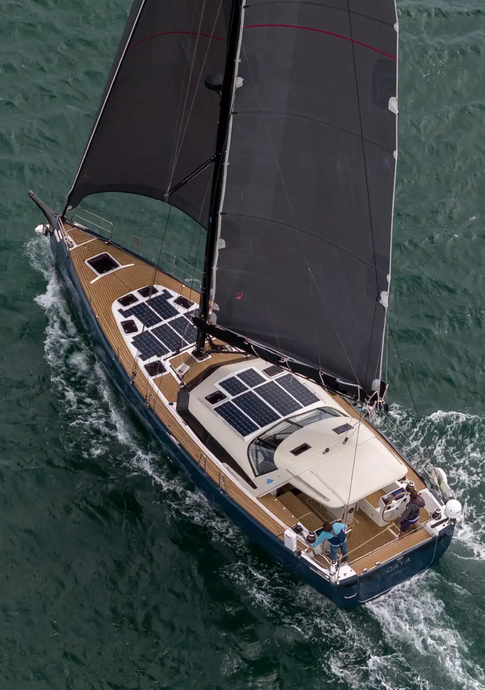 Sailing yacht with flexible Solbian photovoltaic panels on deck and coachroof